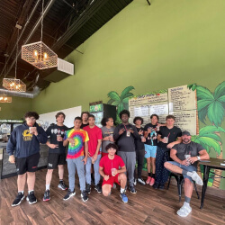 a group of gym mates drinking their delicious protein shakes.