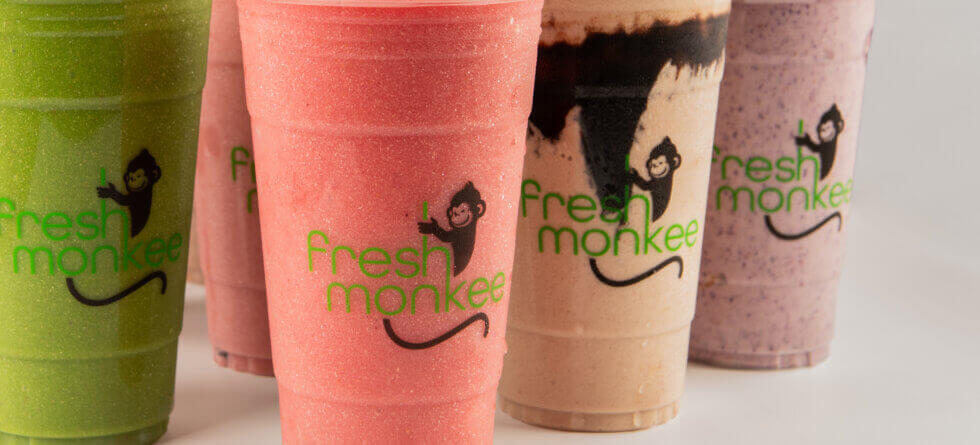 Fresh Monkee shakes in clear cups with fresh ingredients