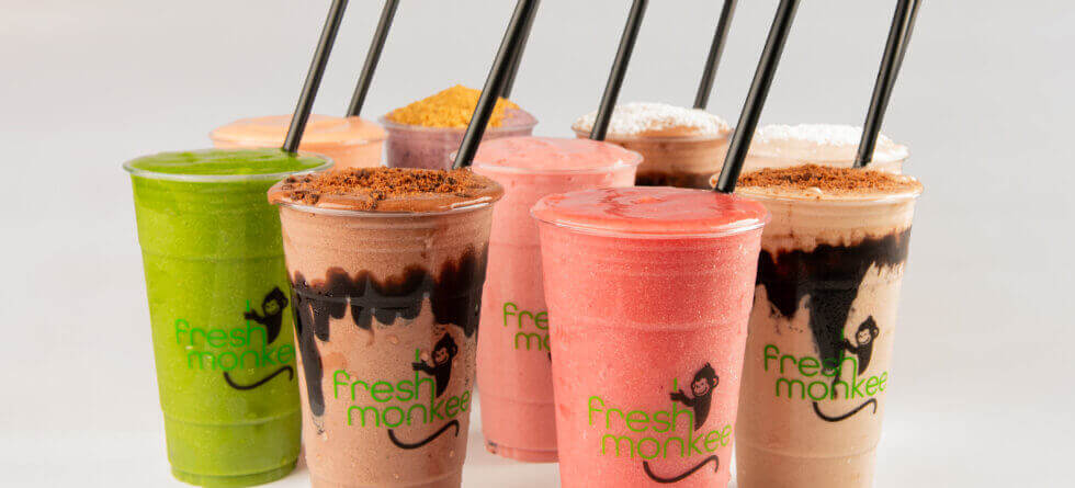Fresh Monkee protein shake near me in clear cups with fresh ingredients
